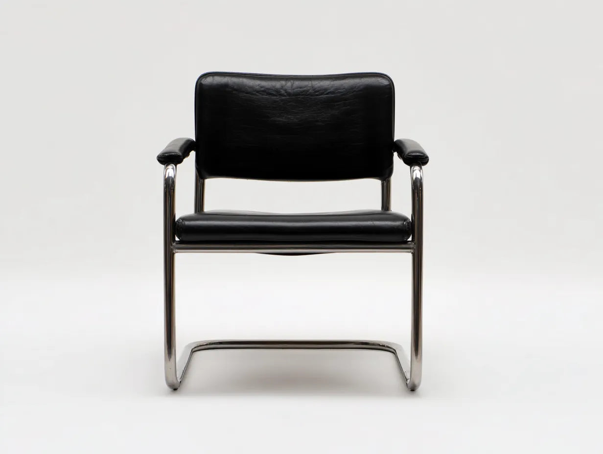Esszimmerstuhl Kunstleder und Metall 56×60×82 cm - Schwarz/Silber - Freischwinger mit Armlehnen